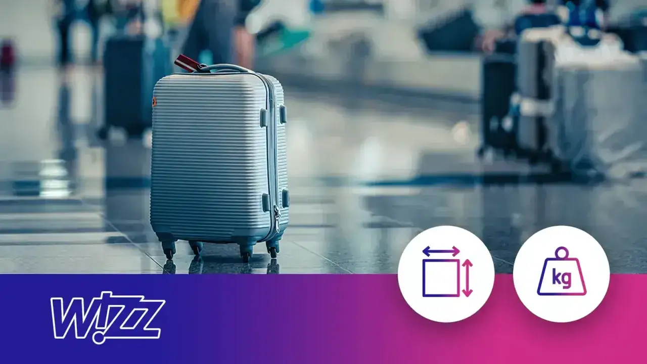 Szara walizka na lotnisku. Ikony symbolizują wymiary Wizzair i wagę bagażu.